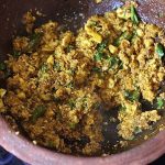 egg bhurji in a clay kadai