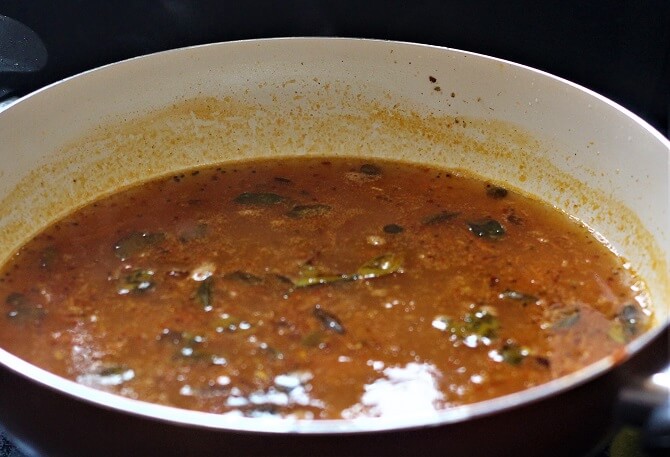 instant tomato rasam recipe in white pan