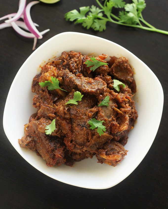 Bhuna Gosht Recipe-A simple mutton curry which is made by roasting the mutton till tender.