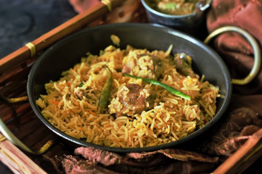 Lucknowi Mutton Biryani Recipe or the Awadhi Biryani. An absolutely delicious recipe cooked with flavorful spices in Dum Pukht method