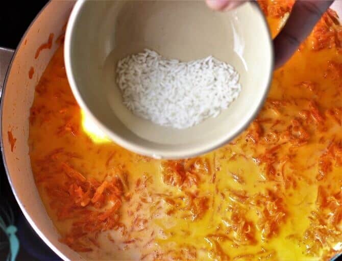 adding rice to carrot pudding
