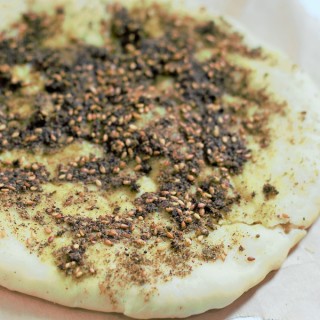 Zaatar Manakish Recipe - Manakeesh Zaatar recipe. Another version of the Arabic bread made with the Arabic spice known as Zaatar which is pretty famous with all the Arabs of every region