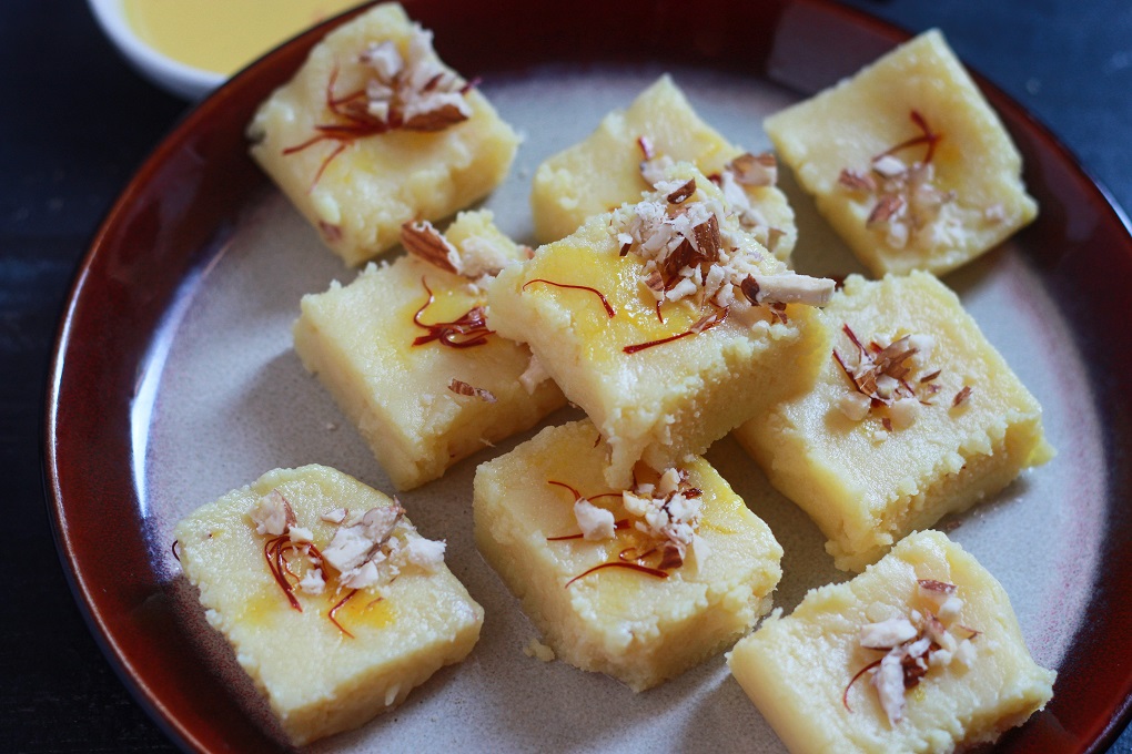 Simple Milk Powder Burfi Recipe - A very simple and easy dessert recipe made in a jiffy with the milk powder. 