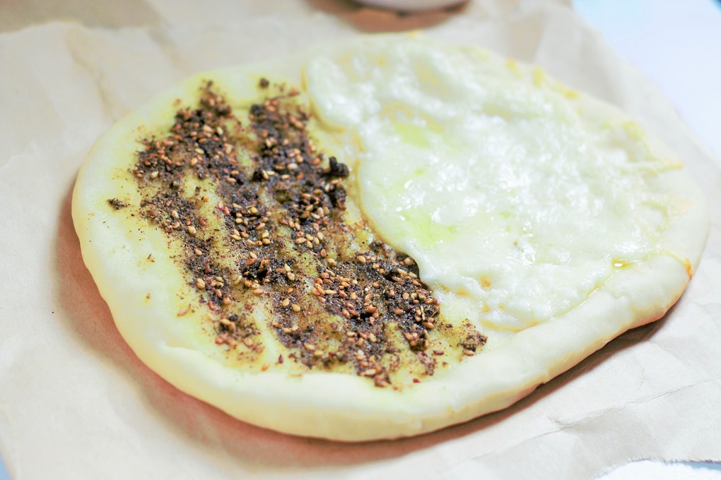Zaatar Manakeesh with Cheese Recipe - Manakish Cheese Zaatar. A flavorful Arabic flat bread recipe made with the yummy goodness of both the Zaatar and Cheese.