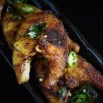 kerala fried fish recipe in a rectangular plate