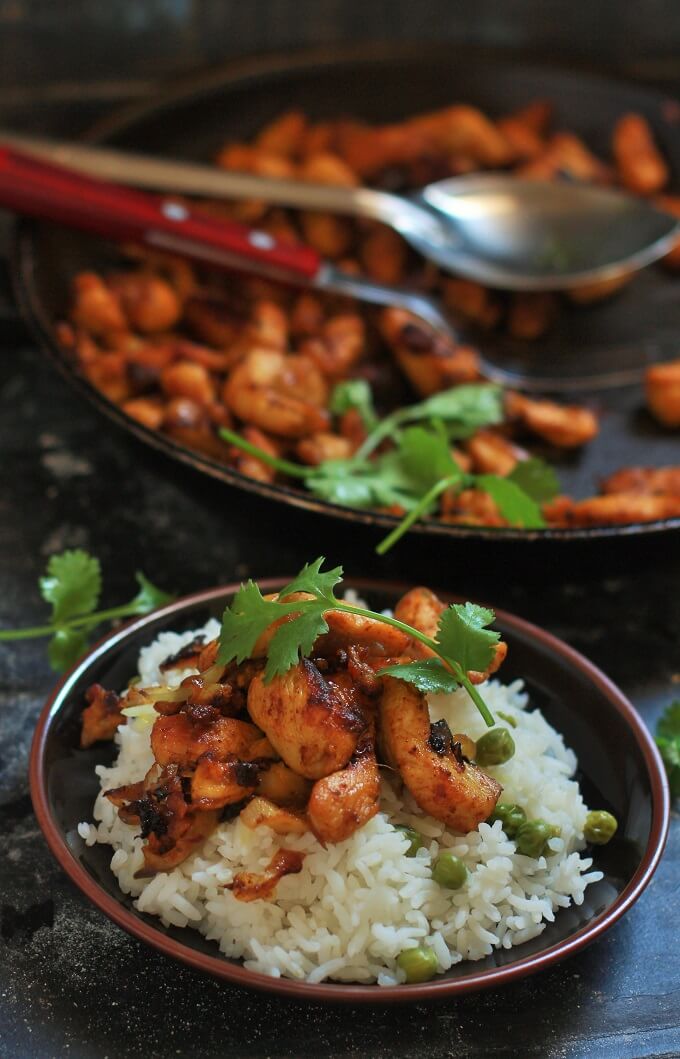 side view of tawa chicken fry on rice