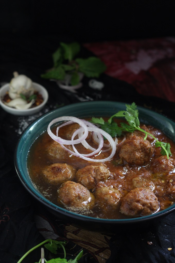 Mutton Kofta Curry or the Indian Meatball Curry recipe, a delicious kofta curry made with mutton mince in succulent onion tomato gravy with aromatic Indian spices. The koftas will be soft on the inside when you follow the simple tip that I have provided in this post
