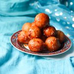 Luqaimat recipe or a kind of arabic sweet dumpling is a very famous dish that the Emaratis enjoy during Ramadan or other times. Pretty easy to make, this dessert takes minimal ingredients, yet tastes absolute awesome.