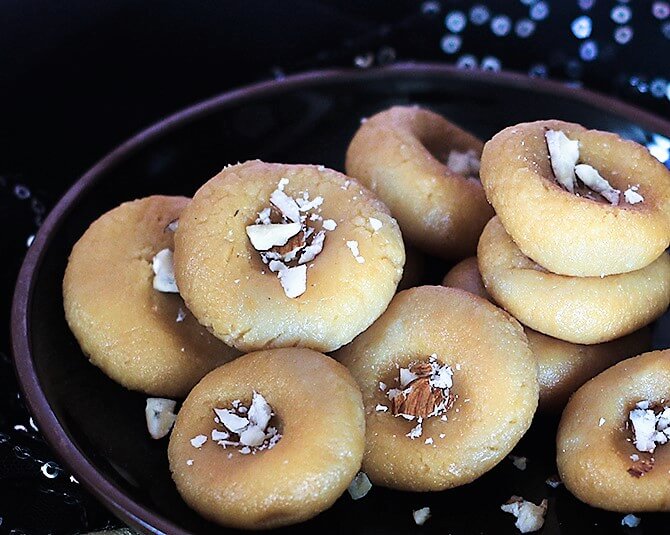 doodh peda recipe topped with badam in a plate