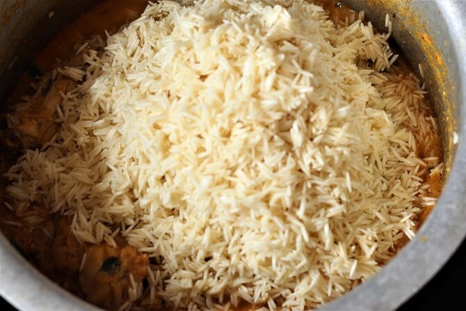 rice added in the south indian chicken biryani yakhni