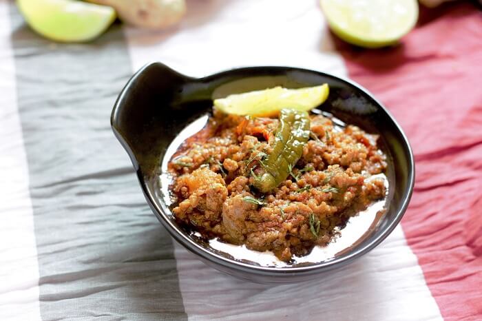 side view of mutton keema recipe in a bowl