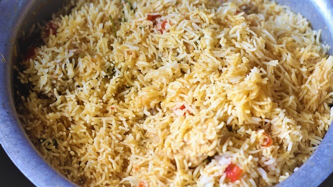 south indian chicken biryani recipe is ready to serve in a vessel